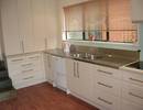 Kiwi Kitchens design featuring large on-bench pantries